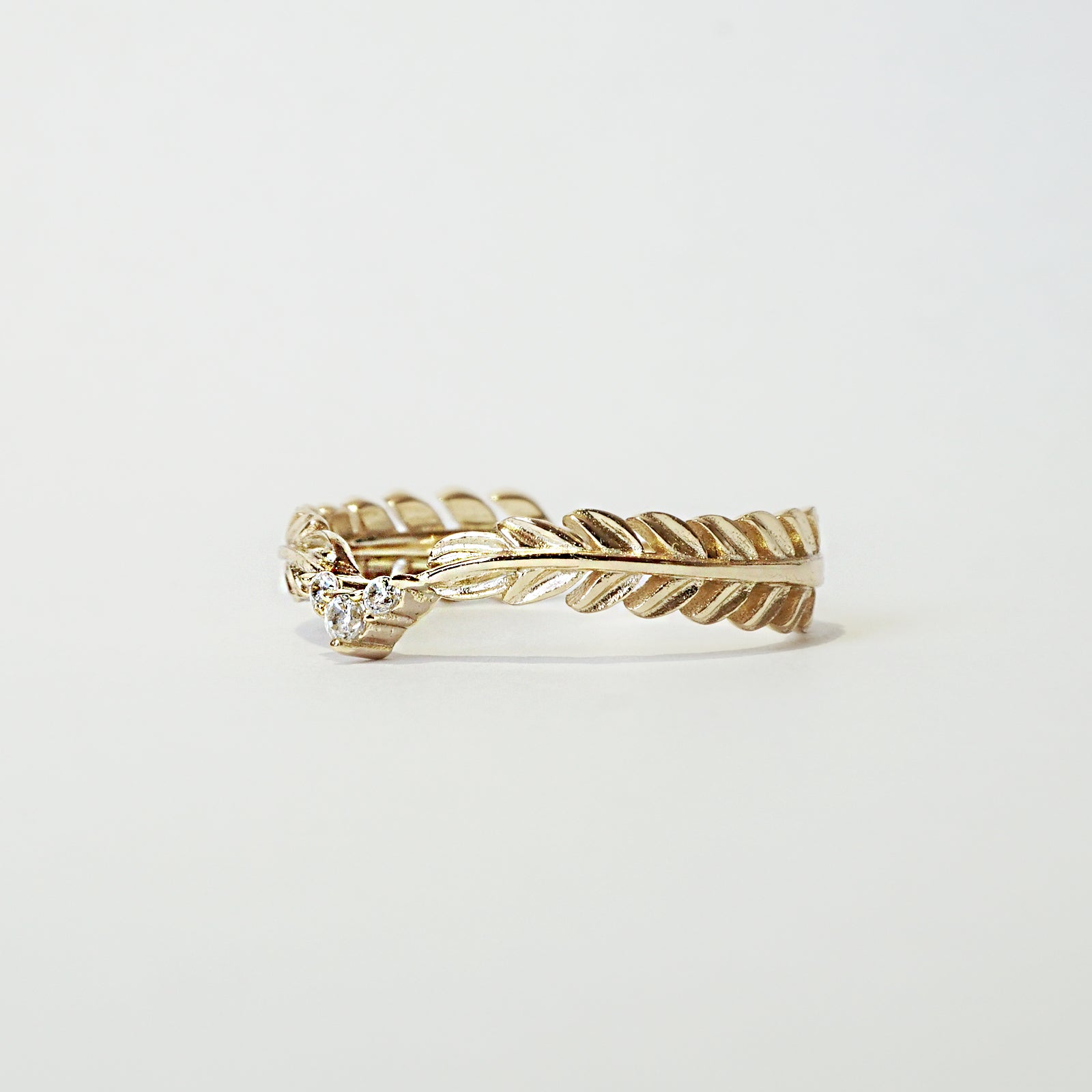 Feather on sale diamond ring